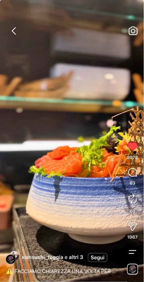 Reel Instagram di Xian Sushi Foggia: ciotola di sashimi di salmone fotografata al banco